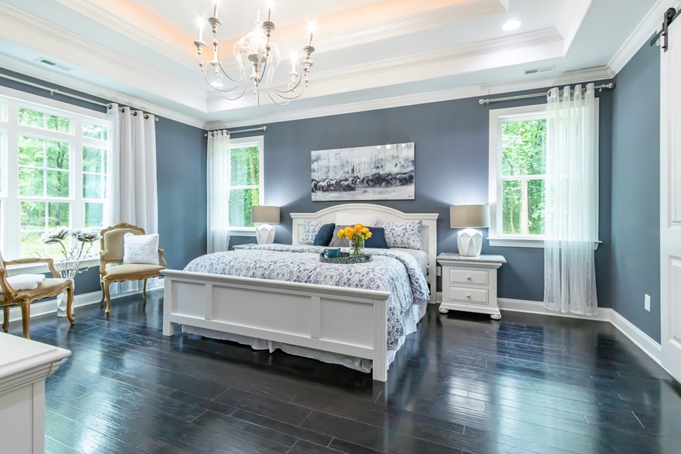 plenty of sun and privacy in the primary master bedroom.